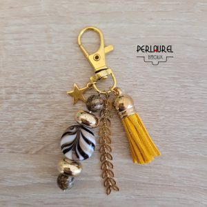 Bijou de sac perle en verre striée